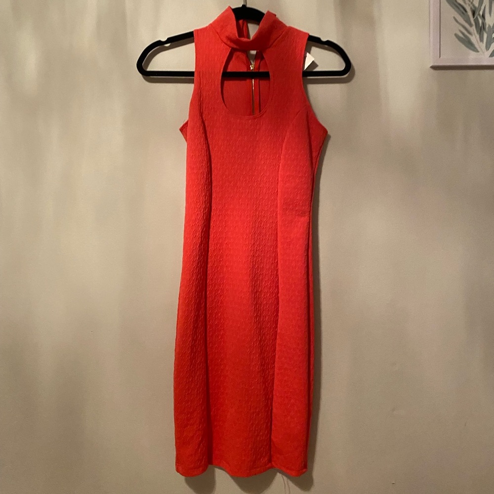 This is a knee/thigh high dress